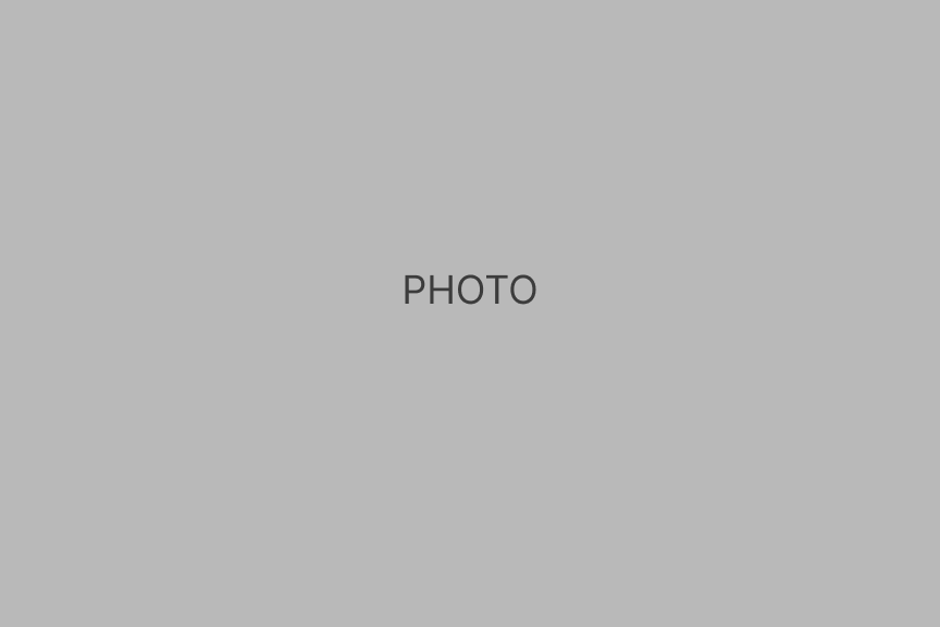 A blank gray background with the word PHOTO in uppercase letters centered in the middle of the image.